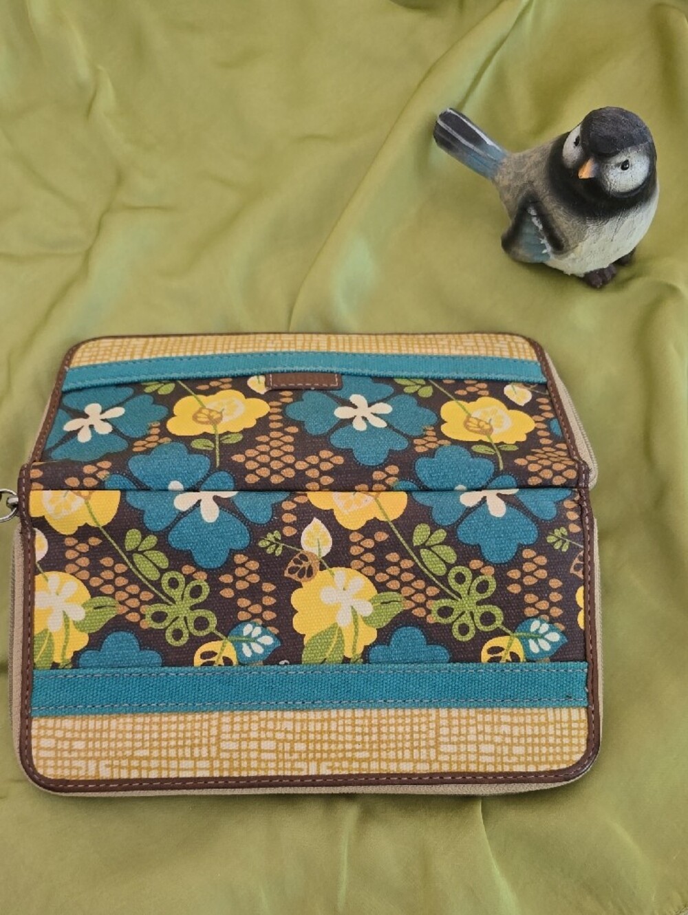 Fossil Key-Per zip-around wallet featuring a brown, yellow, and blue floral patt - Picture 2 of 5